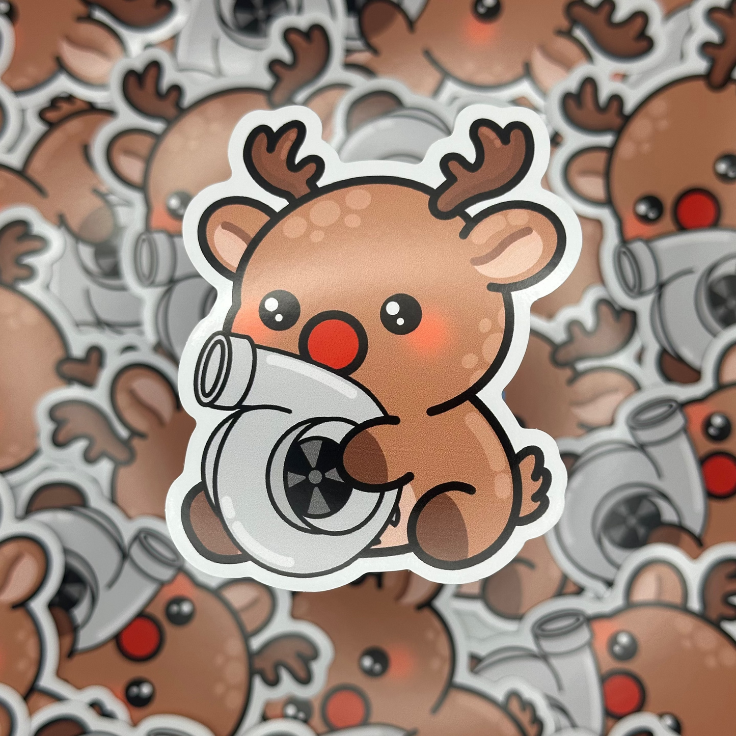 Sticker of a reindeer with a jet engine on a background of similar reindeer stickers.