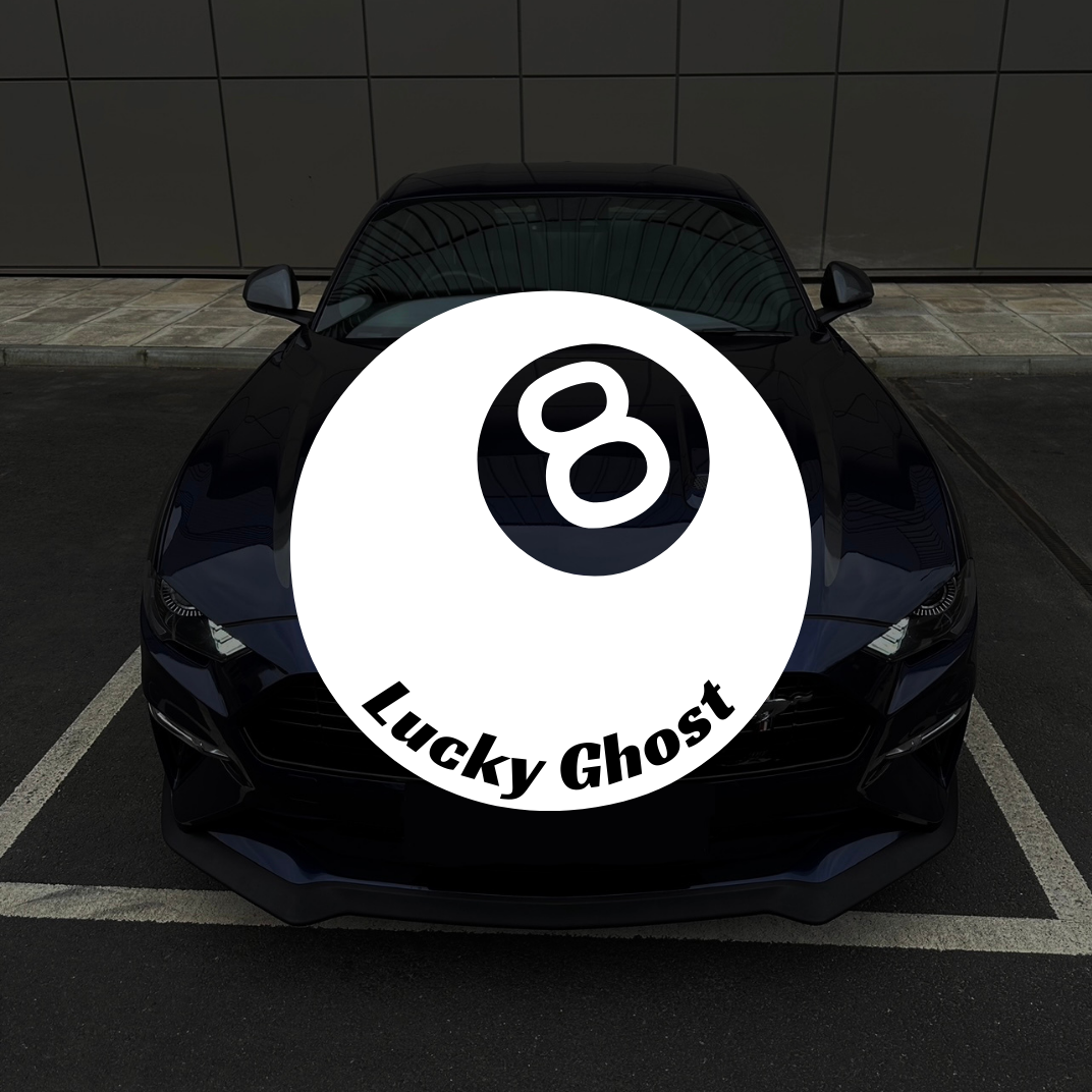 Black car with 'Lucky Ghost' logo on a dark tiled wall background