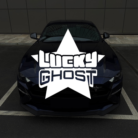 Black car with 'Lucky Ghost' logo on a dark background