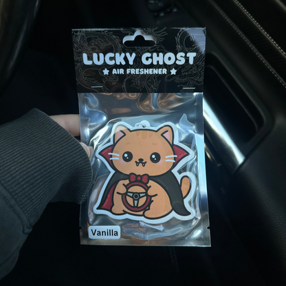 Lucky Ghost air freshener packaging with a cat design on a dark background
