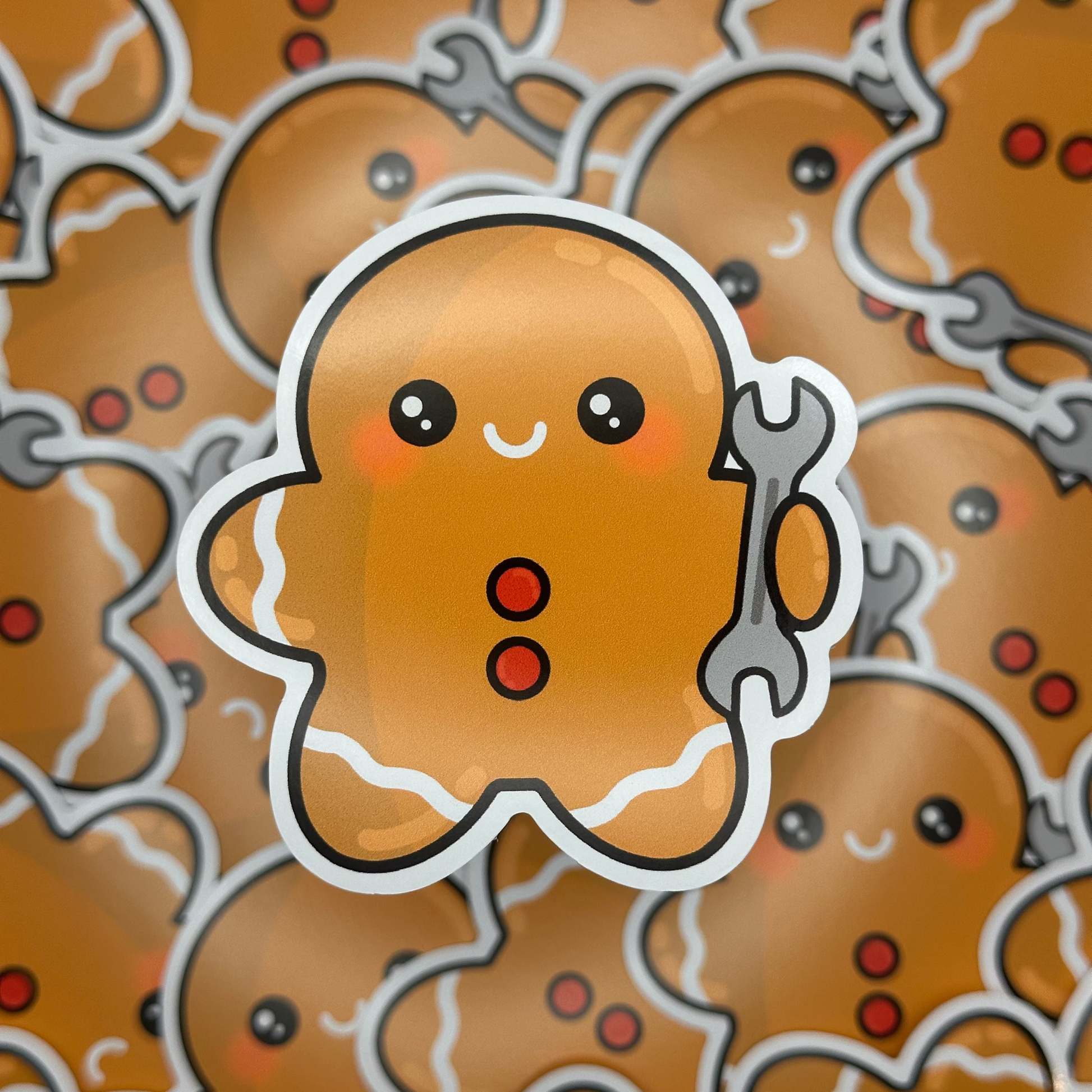 Sticker of a cute gingerbread man on a gingerbread pattern background