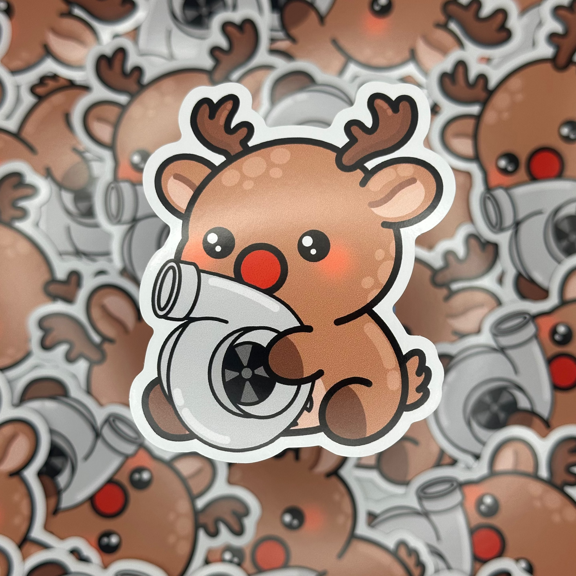 Sticker of a reindeer with a jet engine on a background of similar reindeer stickers.
