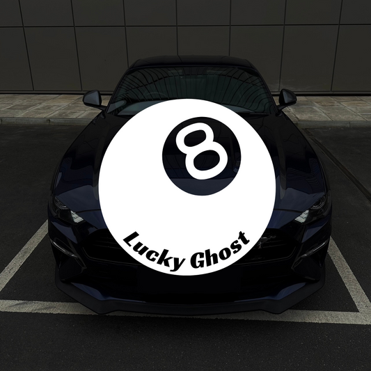 Black car with 'Lucky Ghost' logo on a dark tiled wall background